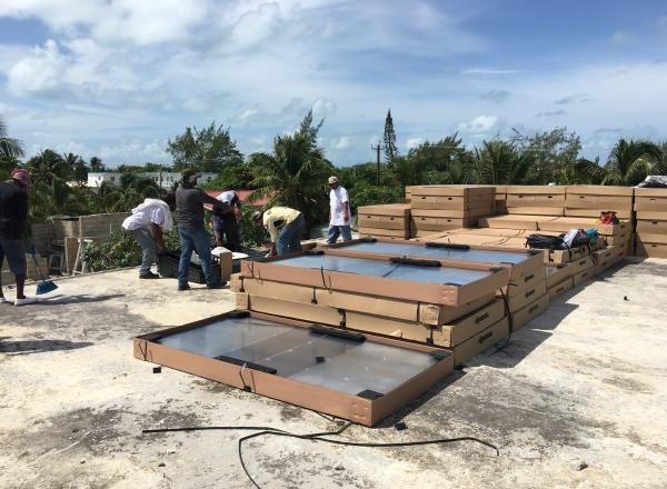 high energy efficiency Air-Conditioning Units in select public buildings in Caye Cualker