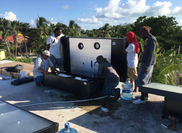 high energy efficiency Air-Conditioning Units in select public buildings in Caye Cualker