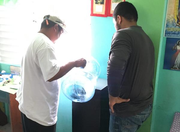 high energy efficiency Air-Conditioning Units in select public buildings in Caye Cualker