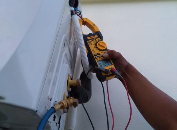 high energy efficiency Air-Conditioning Units in select public buildings in Caye Cualker