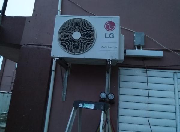 high energy efficiency Air-Conditioning Units in select public buildings in Caye Cualker