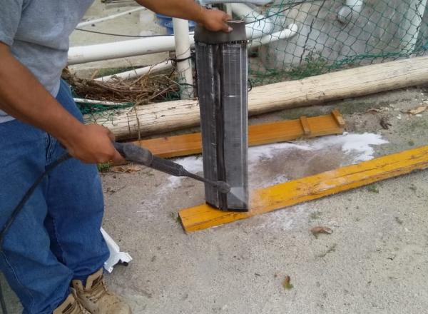 high energy efficiency Air-Conditioning Units in select public buildings in Caye Cualker